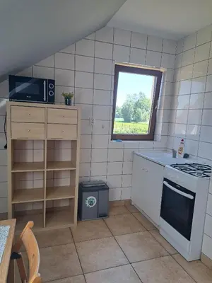 Kuchnia lub aneks kuchenny w obiekcie Ogrodowe Noclegi