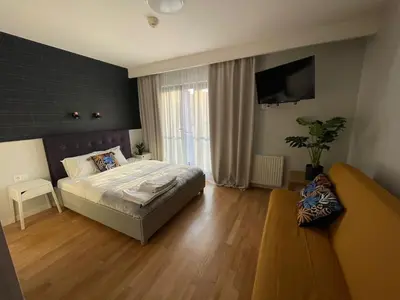 Łóżko lub łóżka w pokoju w obiekcie Komfort w najlepszej lokalizacji