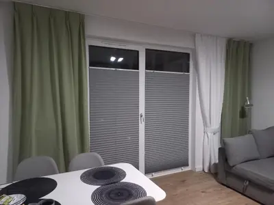 Część wypoczynkowa w obiekcie Na Grobli Riverside Apartment & FREE GARAGE by Noclegi Renters