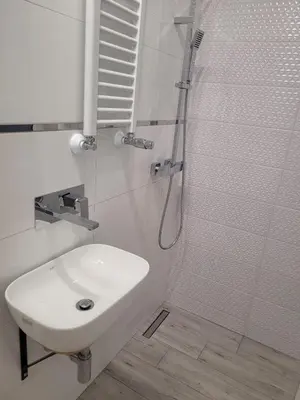 Łazienka w obiekcie Apartment Błękitny