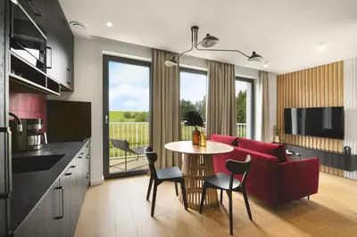 Telewizja i/lub zestaw kina domowego w obiekcie Apartamenty Na Łąkach