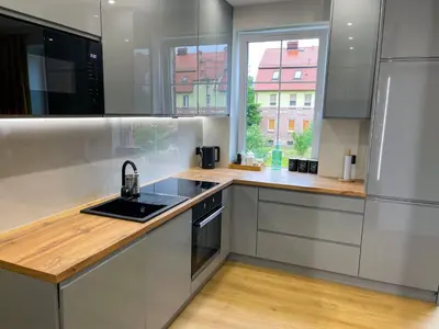 Kuchnia lub aneks kuchenny w obiekcie Apartament Kamienica Loft