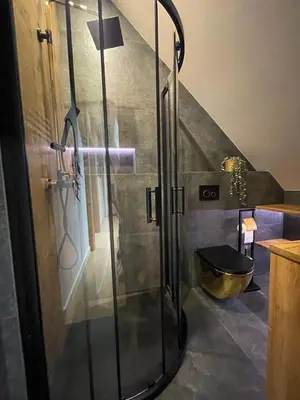 Łazienka w obiekcie Apartament Kamienica Loft
