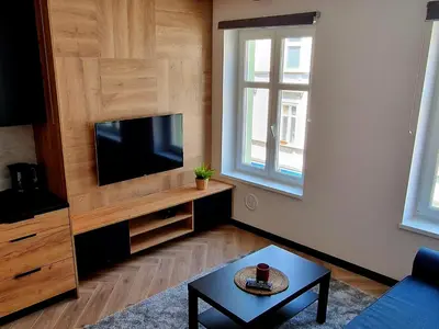 Telewizja i/lub zestaw kina domowego w obiekcie Apartament Książ