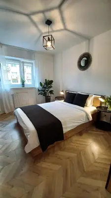 Łóżko lub łóżka w pokoju w obiekcie katedrahouse