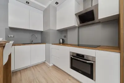 Kuchnia lub aneks kuchenny w obiekcie Modern Studio with Balcony for 4 Guests in Wrocław by Noclegi Renters