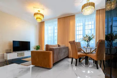 Telewizja i/lub zestaw kina domowego w obiekcie Apartament Versace Jana Pawła