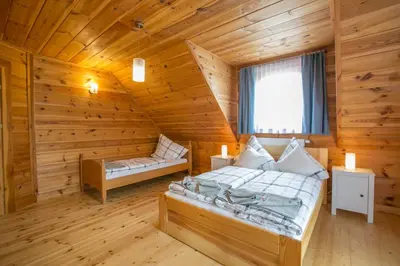Łóżko lub łóżka w pokoju w obiekcie u Marysi