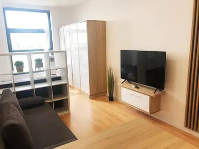 Telewizja i/lub zestaw kina domowego w obiekcie Apartimento Hydral Sole