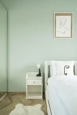 Łóżko lub łóżka w pokoju w obiekcie RentPlanet - Apartamenty Zajezdnia
