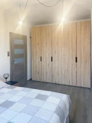 Łóżko lub łóżka w pokoju w obiekcie Apartament Pyskowice Centrum