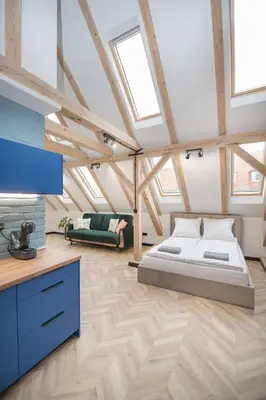 Łóżko lub łóżka w pokoju w obiekcie Apartament Wincentego Styczyńskiego