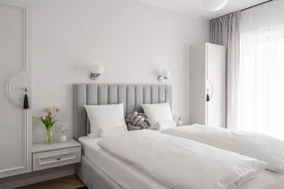 Łóżko lub łóżka w pokoju w obiekcie RentPlanet - Nowa Manufaktura