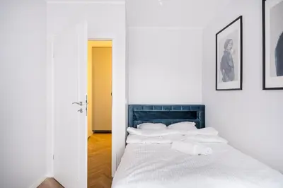 Łóżko lub łóżka w pokoju w obiekcie RentPlanet - Nowa Manufaktura