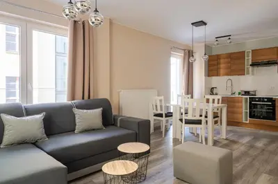 Kuchnia lub aneks kuchenny w obiekcie RentPlanet - Apartamenty Księcia Witolda