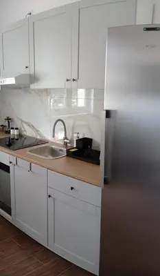 Kuchnia lub aneks kuchenny w obiekcie Hostel Wiśniowa 55