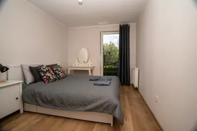 Łóżko lub łóżka w pokoju w obiekcie Domek w Antoninie