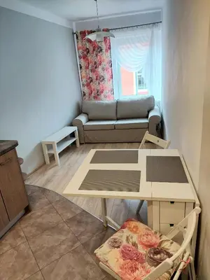 Łóżko lub łóżka w pokoju w obiekcie Apartament w Centrum