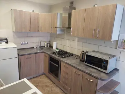 Kuchnia lub aneks kuchenny w obiekcie Apartament w Centrum