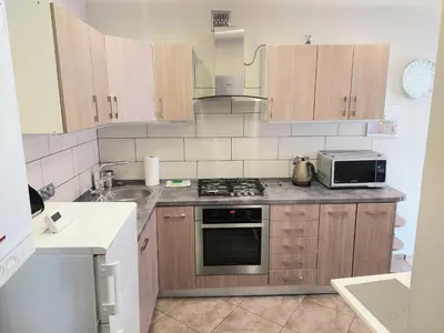 Kuchnia lub aneks kuchenny w obiekcie Apartament w Centrum