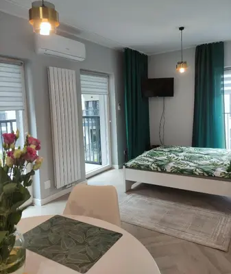 Łóżko lub łóżka w pokoju w obiekcie Elegant&cosy2