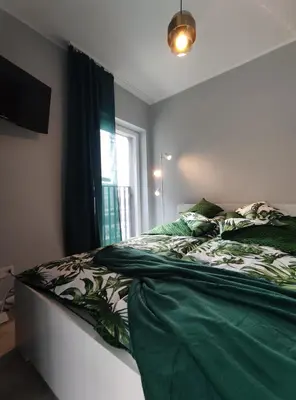 Łóżko lub łóżka w pokoju w obiekcie Elegant&cosy2