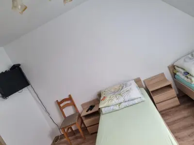 Łóżko lub łóżka w pokoju w obiekcie Agroturystyka nad Stawem