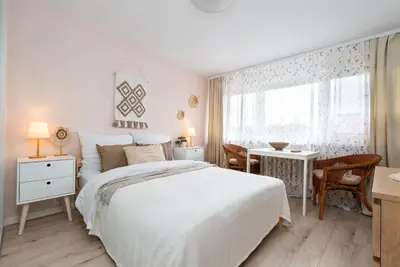 Łóżko lub łóżka w pokoju w obiekcie Kairos Apartments- OPAL - ścisłe centrum