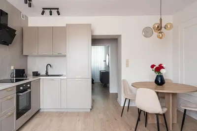 Kuchnia lub aneks kuchenny w obiekcie RentPlanet - Apartament Piłsudskiego