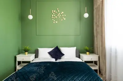 Łóżko lub łóżka w pokoju w obiekcie RentPlanet - Apartament Piłsudskiego