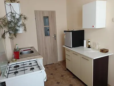 Kuchnia lub aneks kuchenny w obiekcie Oficynka