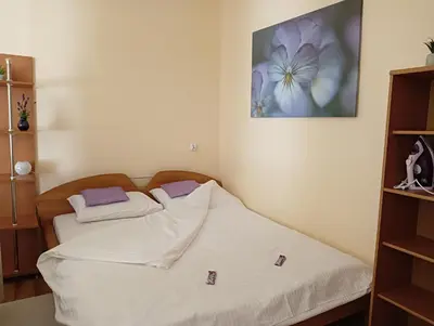 Łóżko lub łóżka w pokoju w obiekcie Oficynka