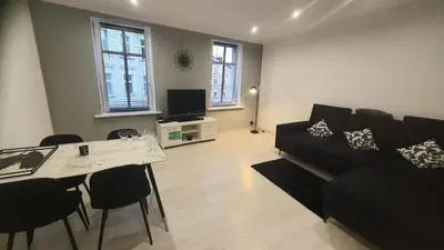 Telewizja i/lub zestaw kina domowego w obiekcie Komfortowy Apartament u Baltazara