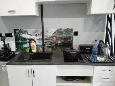 Kuchnia lub aneks kuchenny w obiekcie Komfortowy Apartament u Baltazara