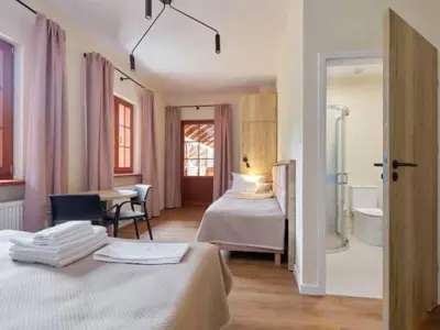 Łóżko lub łóżka w pokoju w obiekcie Villa Winkler