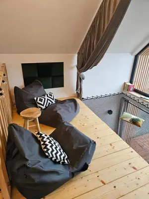 Telewizja i/lub zestaw kina domowego w obiekcie Domki Pod Lasem - Domek Sosnowy