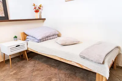 Łóżko lub łóżka w pokoju w obiekcie Apartament 592