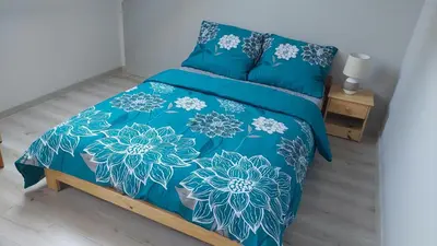 Łóżko lub łóżka w pokoju w obiekcie Agroturystyka Zielona Dolina