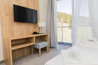 Telewizja i/lub zestaw kina domowego w obiekcie VacationClub - Aparthotel Czarna Góra 218