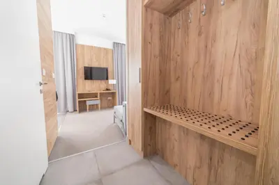 Telewizja i/lub zestaw kina domowego w obiekcie VacationClub - Aparthotel Czarna Góra 221