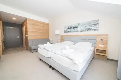 Łóżko lub łóżka w pokoju w obiekcie VacationClub - Aparthotel Czarna Góra 309