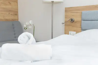 Łóżko lub łóżka w pokoju w obiekcie VacationClub - Aparthotel Czarna Góra 309