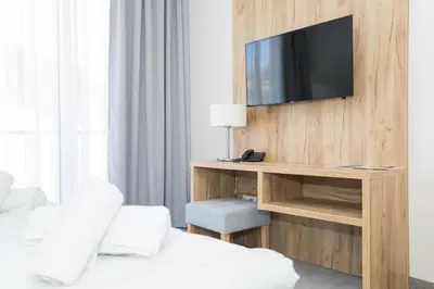 Telewizja i/lub zestaw kina domowego w obiekcie VacationClub - Aparthotel Czarna Góra 309