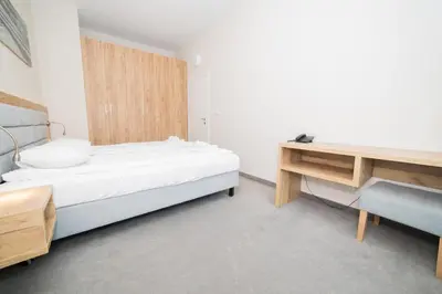 Łóżko lub łóżka w pokoju w obiekcie VacationClub - Aparthotel Czarna Góra 413
