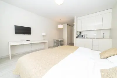Łóżko lub łóżka w pokoju w obiekcie VacationClub - Solden Apartament 14