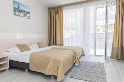 Łóżko lub łóżka w pokoju w obiekcie VacationClub - Solden Apartament 14
