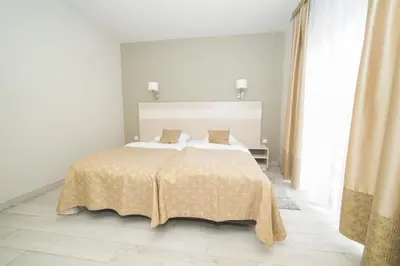 Łóżko lub łóżka w pokoju w obiekcie VacationClub - Solden Apartament 7