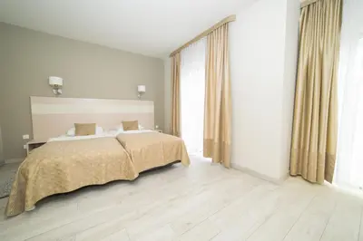 Łóżko lub łóżka w pokoju w obiekcie VacationClub - Solden Apartament 7