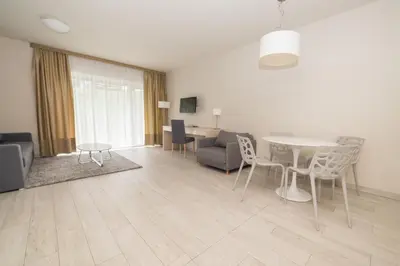 Telewizja i/lub zestaw kina domowego w obiekcie VacationClub - Solden Apartament 7