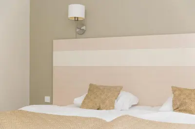 Łóżko lub łóżka w pokoju w obiekcie VacationClub - Solden Apartament 7